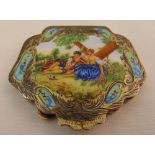 A 19th century Austrian white metal and enamel compact painted with a courting couple in a garden,
