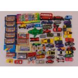 A quantity of diecast cars, buses and vans to include Matchbox and Corgi, some in original