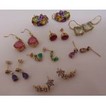 Eight pairs of 9ct gold earrings set with various coloured stones, approx total weight 27.7g