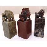 Three oriental hardstone seals with dog of foe finials, tallest 80cm (h)