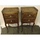 A pair of French style rectangular two drawer side tables with gilt metal handles and applied