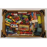 A quantity of diecast cars, trucks and buses to include Corgi, Matchbox and Dinky, all playworn
