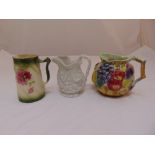 Three decorative ceramic jugs, tallest 17cm (h)