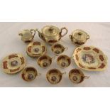 Aynsley J A Bailey tea service, hand painted and gilded against a red ground, to include a teapot,