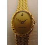 Audermars Piquet 18ct gold ladies wristwatch on integral bracelet, approx total weight 49.9g