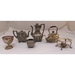 A quantity of silver plate to include a three piece teaset, a tea kettle on stand and a bonbon dish