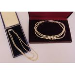Two antique pearl necklaces in fitted cases