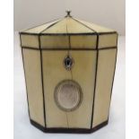 A George III octagonal tea caddy with applied silver cartouche, escutcheon and finial to hinged