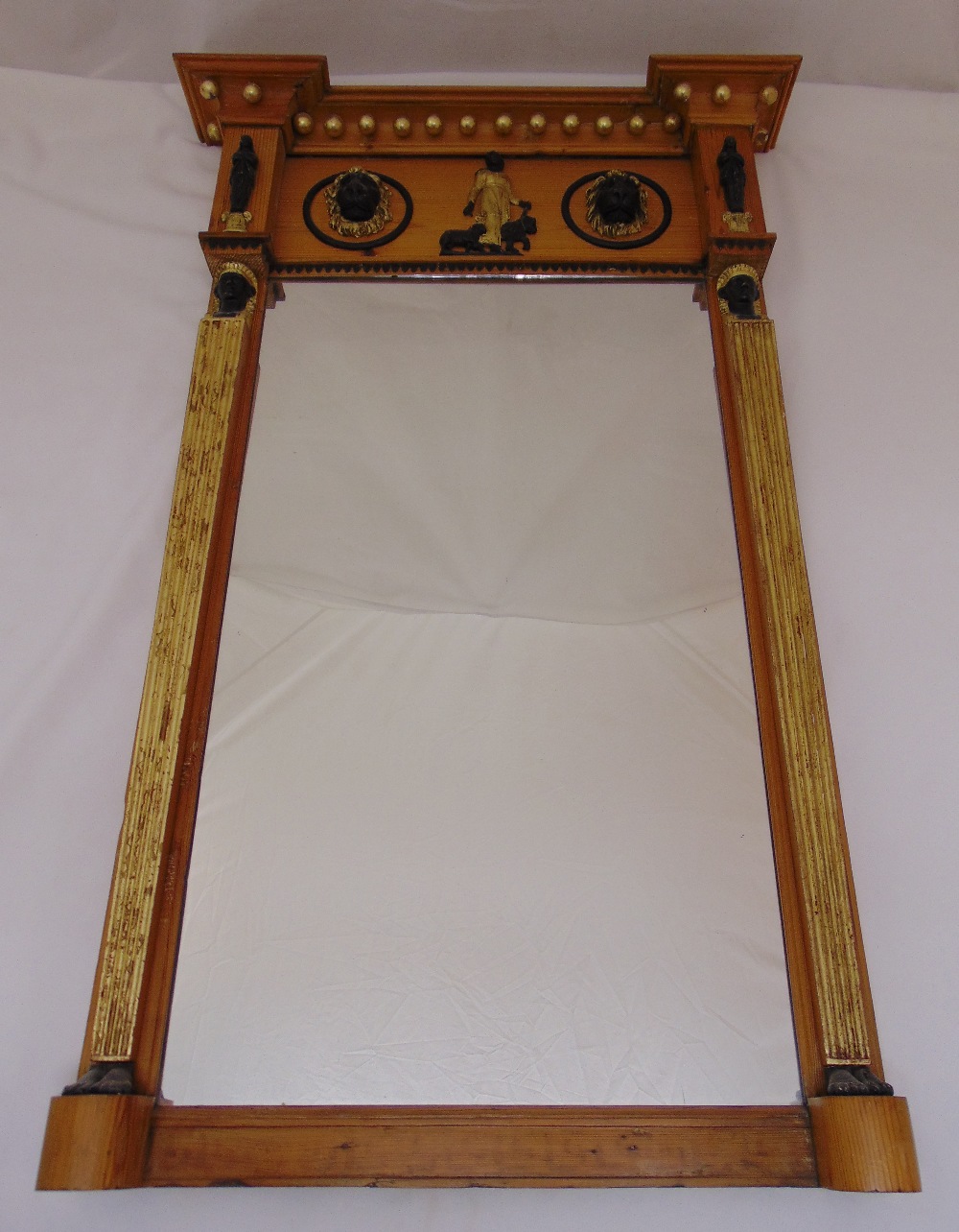 A Regency style rectangular gilded wooden wall mirror, 101.5 x 65 x 10.5cm