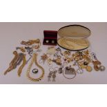 A quantity of costume jewellery to include necklaces, brooches, bracelets, cufflinks and earrings