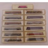 A quantity of Z gauge Marklin coaches all in original plastic packaging (13)