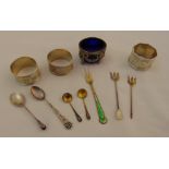 A quantity of silver and white metal to include napkin rings, a salt and flatware, approx total