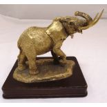 Anthony J Jones, gilded bronze figurine The Golden Elephant mounted on a rectangular wooden base,