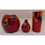 Three Poole Pottery lava flame flambé design vases of various shape and size, marks to the bases,