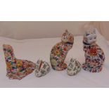 A quantity of Chinese ceramic figurines to include two cats, two rabbits and a seal, tallest 26cm (
