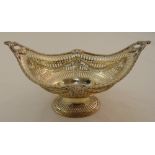 A Victorian pierced oval silver fruit dish on raised oval base, London 1891, approx total weight