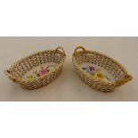 A pair of 19th century Meissen bonbon oval baskets, one restored, marks to the bases, 13.5 x 9cm