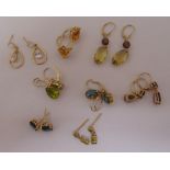 Eight pairs of 9ct gold earrings set with various coloured stones, approx total weight 18.5g