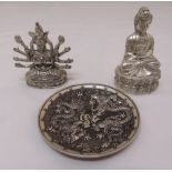 A Chinese white metal dish heavily embossed with dragons chasing a flaming pearl 10cm (d) and two