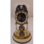 Kaiser mantle clock in glass dome with rotating globe pendulum, to include original instructions,