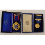 A 14ct gold Vintners Society medallion in fitted case and a silver gilt Masonic medal in fitted
