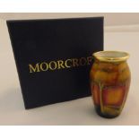 Moorcroft enamel miniature vase decorated with a sunset forest, marks to the base, in original