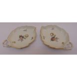 A pair of Royal Copenhagen bonbon dishes in the form of leaves decorated with floral sprays, marks
