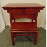An early 20th century oriental lacquered wooden desk of rectangular form with a matching stool, desk