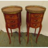 A pair of French style cylindrical three drawer side tables with pierced gallery tops on cabriole
