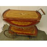 A Sorrento style shaped rectangular two tier drinks trolley, turned wooden handle, hinged side
