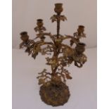 Gilded metal five branch table candelabrum on naturalistic base converted to electric, 51cm (h)