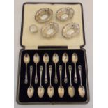 A cased set of twelve hallmarked silver coffee spoons, four hallmarked silver bonbon dishes and a