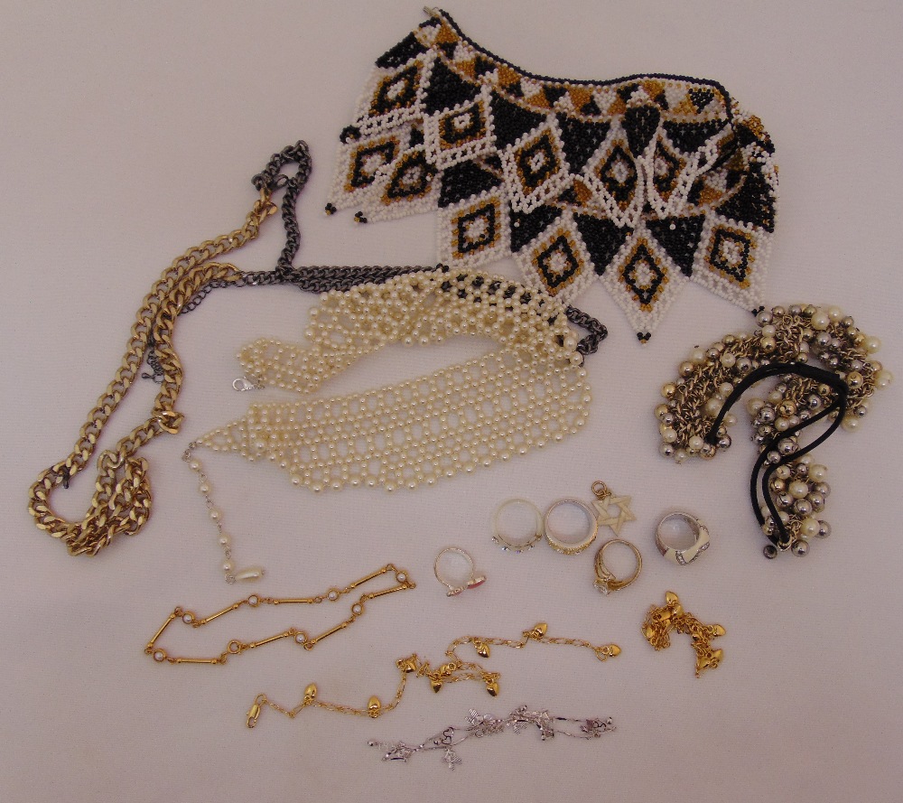 A quantity of costume jewellery to include necklaces and rings