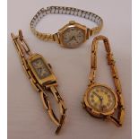 Three 9ct gold ladies wristwatches, one on expanding gold plated bracelet