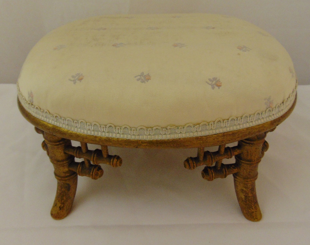 A Victorian aesthetic style gilded wooden foot stool with upholstered top decorated with roses, 17 x