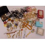A quantity of costume jewellery to include earrings, necklaces, brooches, pendants, bracelets, rings