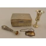 A quantity of silver to include a cigarette box, a Kiddush cup, a whisky label and a seal
