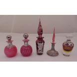 Five glass perfume bottles, four with silver overlays, tallest 17.5cm (h)
