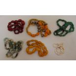 Six bead necklaces to include an amber necklace