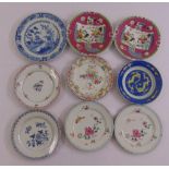 A quantity of ceramic wall plates of varying size and style (9)