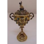 A 19th century continental silver gilt cup and cover, the lobed body inset with turquoise and