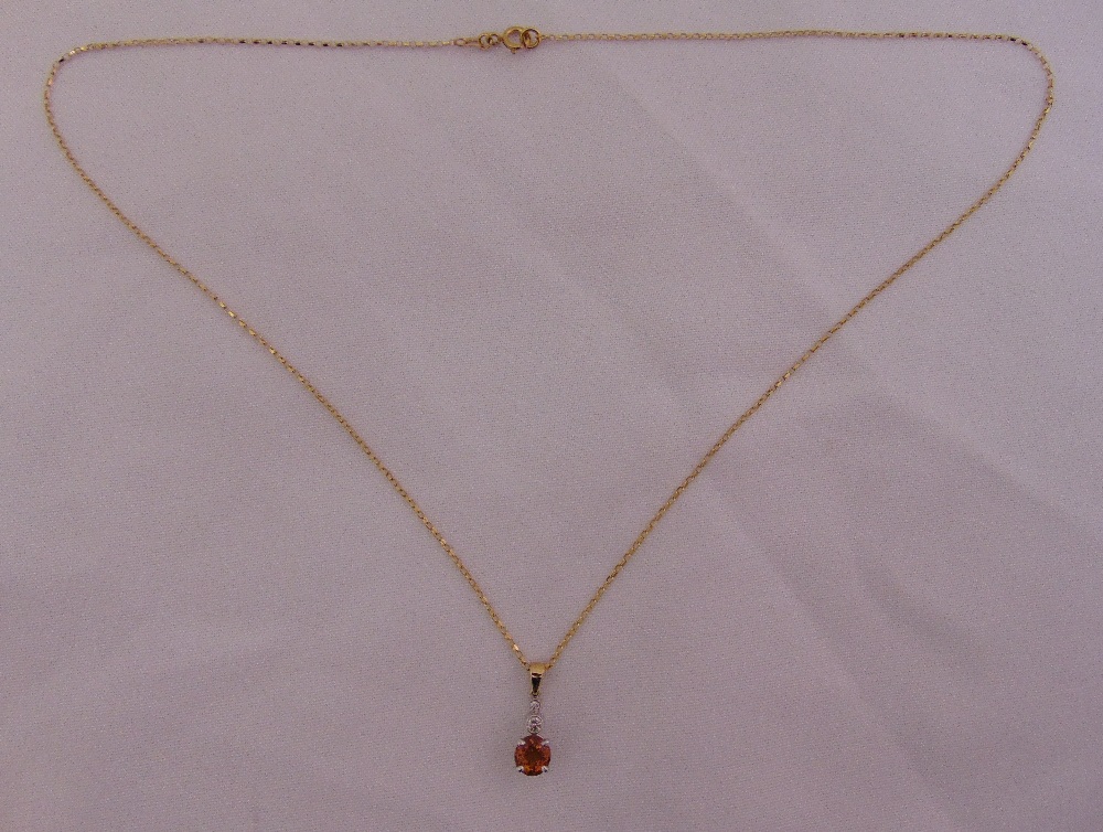 9ct gold, citrine and diamond pendant on a 9ct gold chain, approx total weight 4.9g