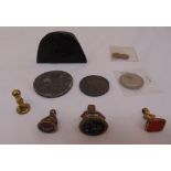 A quantity of collectables to include seals, a leather coin case with an image of Napoleon on