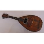 An Italian balloon back mandolin with tortoiseshell inlay circa 1900, label for Pietro Tonelli of