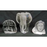 Three Scandinavian glass figurines to include a lion, an elephant and penguins, tallest 21cm (h)