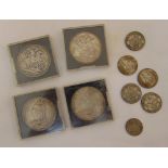 A quantity of silver coins to include four Queen Victoria crowns