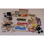 A quantity of costume jewellery to include necklaces and earrings