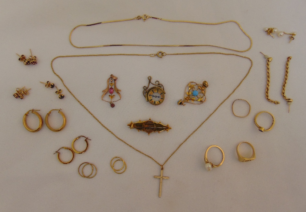 A quantity of 9ct gold jewellery to include earrings, brooches, a ring and chains, approx total