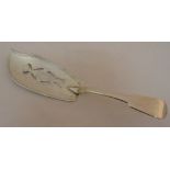 A William IV Irish hallmarked silver fish slice, fiddle pattern the blade pierced and engraved