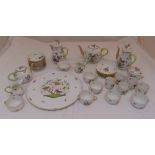 Herend tea and coffee set decorated with birds and butterflies to include cups, saucers, a coffee